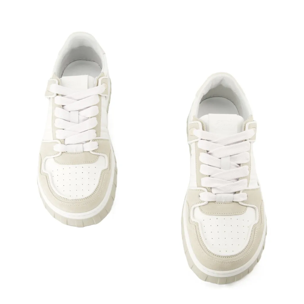 Ami Logo Embossed Low-Top Sneakers
