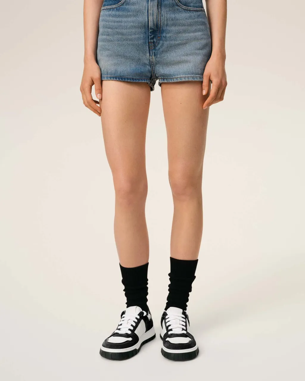 Ami Logo Embossed Low-Top Sneakers
