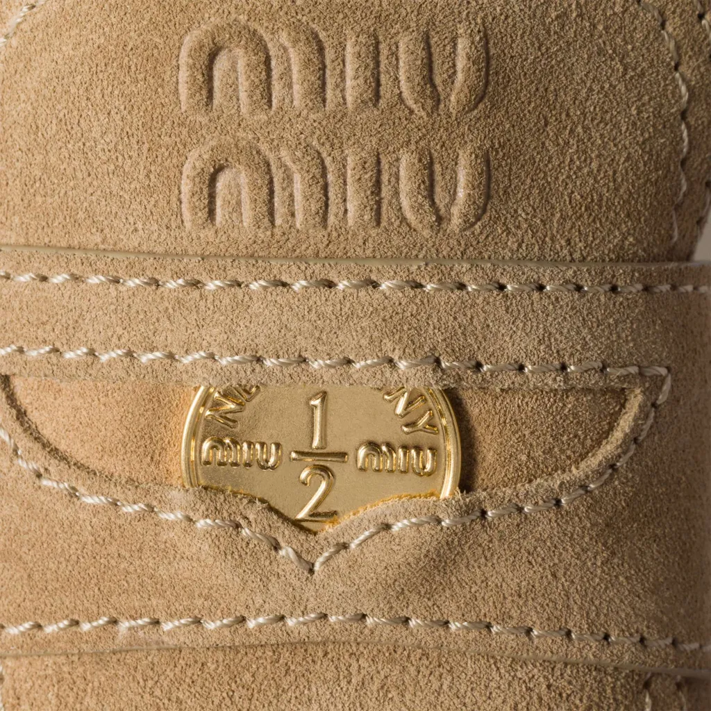 Miu Miu Logo-Embossed Slip-On Mules