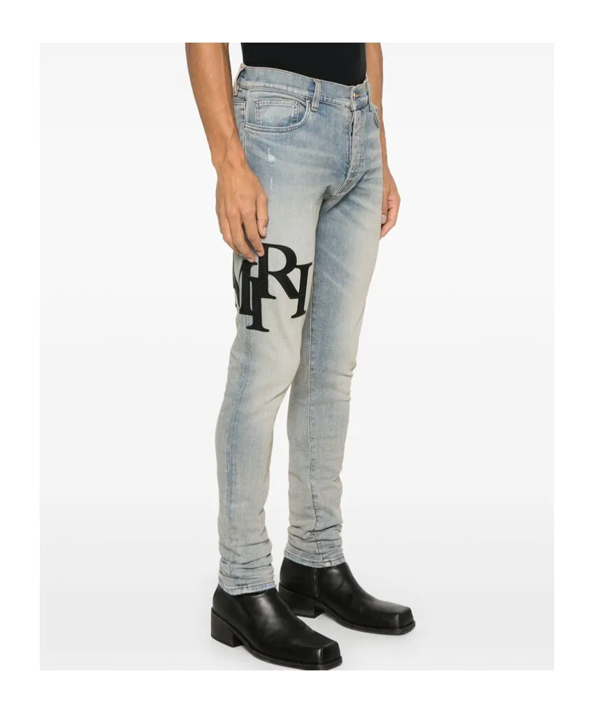 Amiri Logo Embroidered Distressed Skinny Jeans