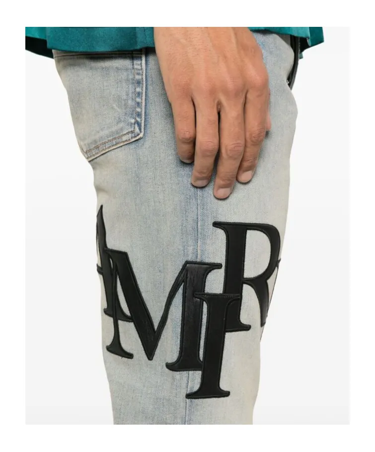 Amiri Logo Embroidered Distressed Skinny Jeans