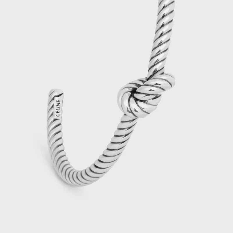 Knot Cord Patterned Cuff In Brass With Rhodium Finish