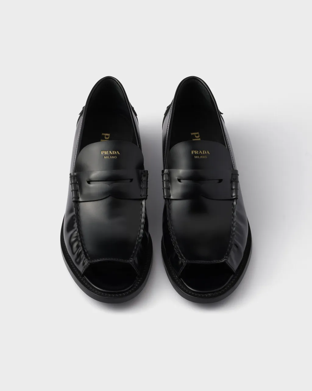 Prada Logo-Printed Penny Loafers