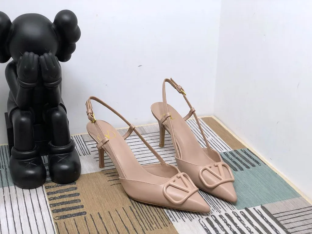 Valentino	Vlogo Plaque Pointed Toe Slingback Pumps