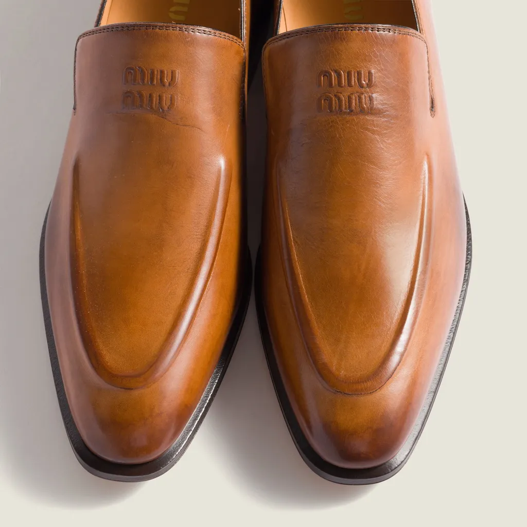 Miu Miu Logo-Embossed Mocassinis