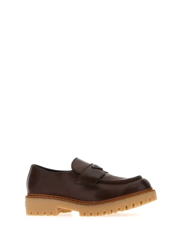 Prada Logo Plaque Round Toe Loafers
