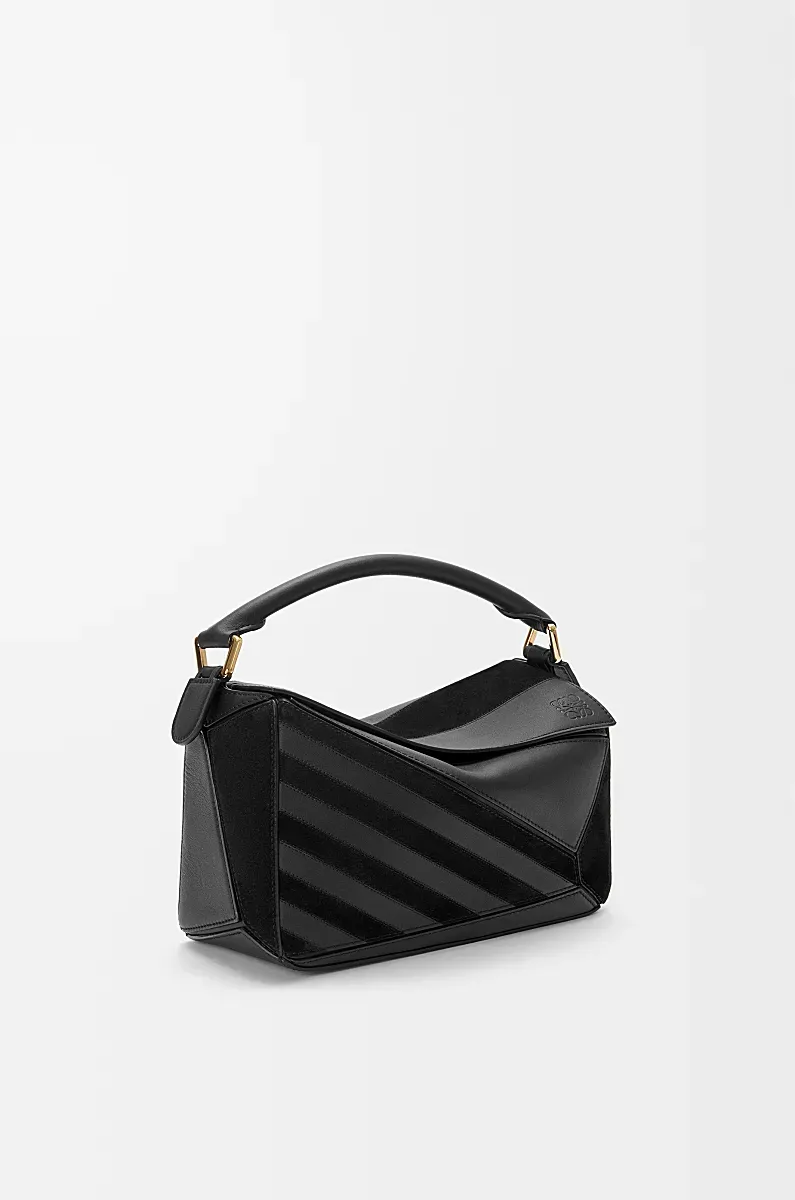 Puzzle Suede Clutch Bag