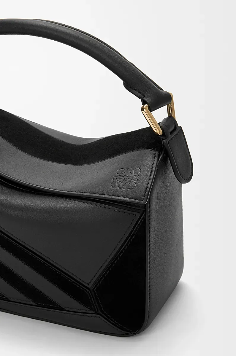 Puzzle Suede Clutch Bag