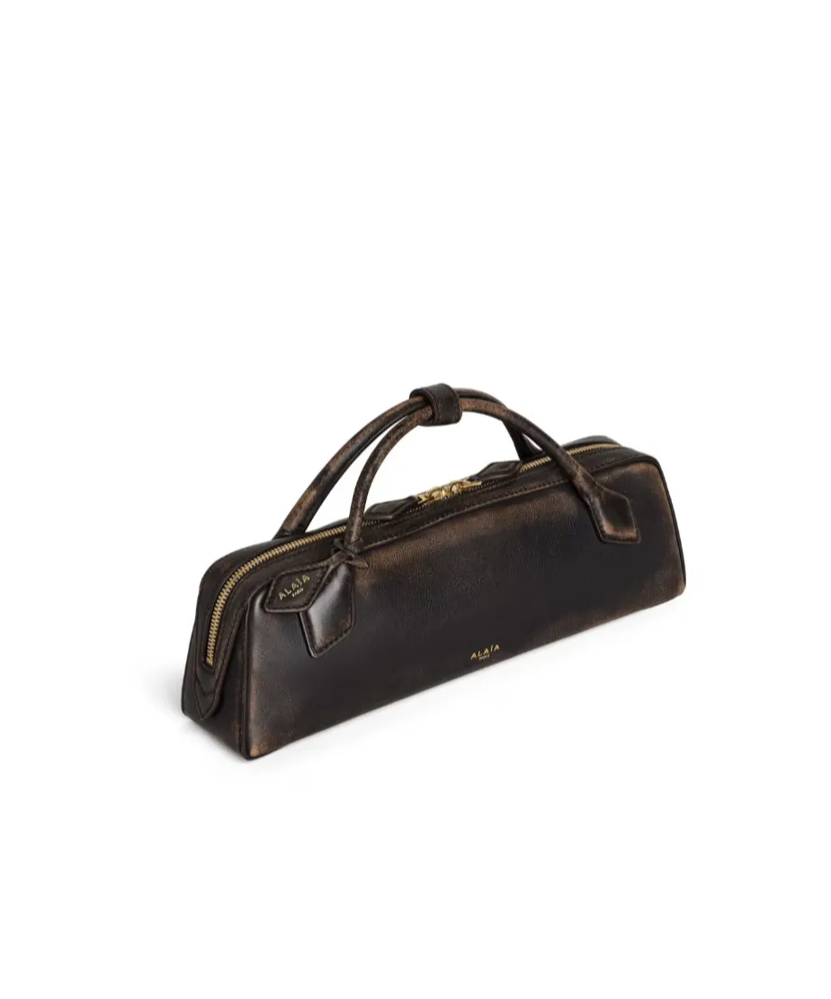 Le Teckel Clutch In Aged Leather