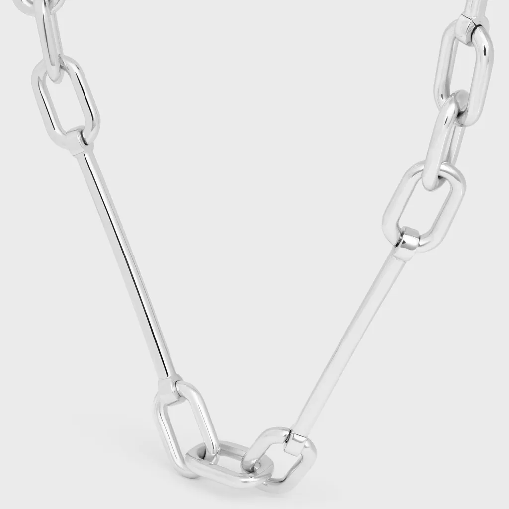 Celine Charms Thin Short Chain Necklace In Brass With Rhodium Finish