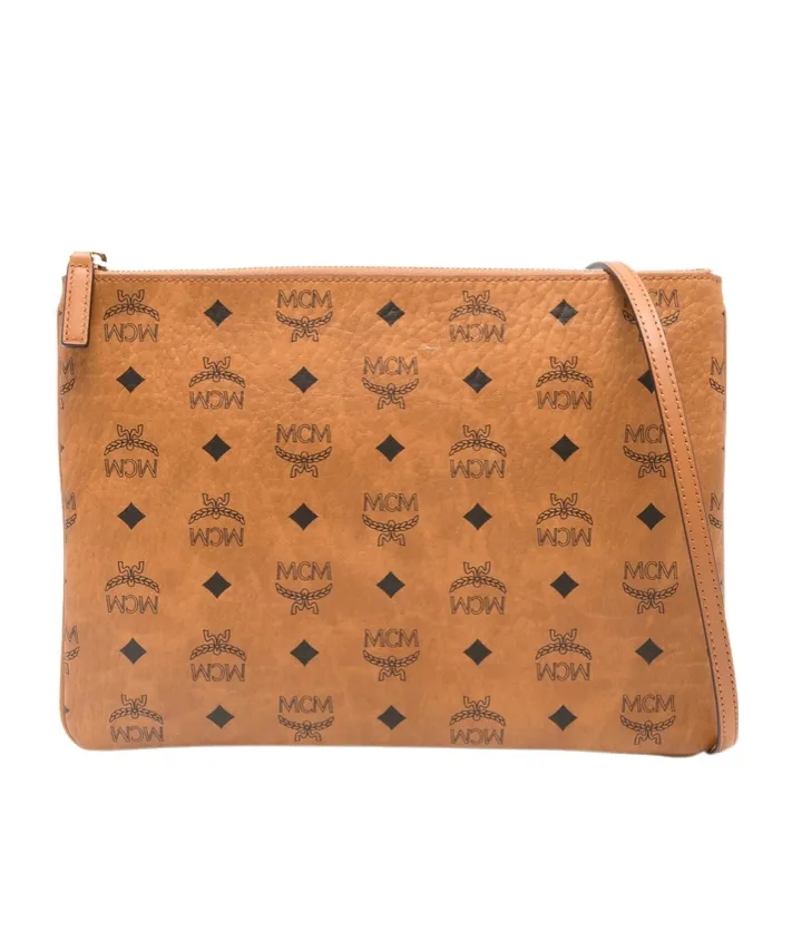 Mcm Logo Patterned Zipped Clutch Bag