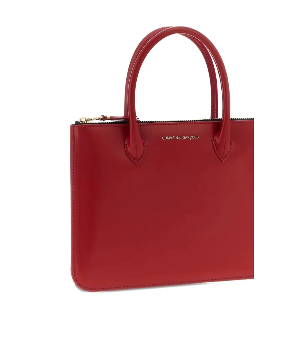 Comme Des GarÇOns Wallet Logo Printed Handbag