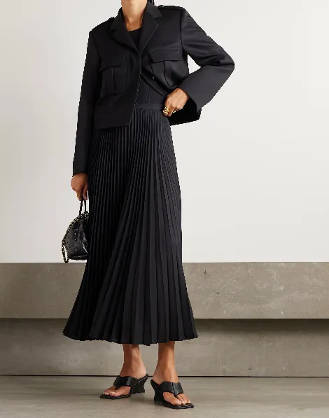 A Long Dress Made Of Pleated Crepe Fabric