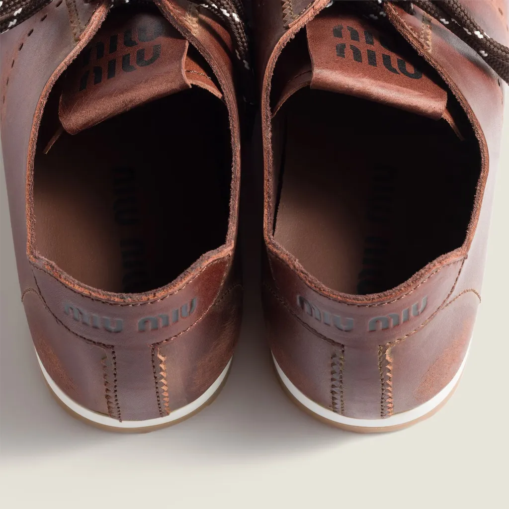 Plume Leather Sneakers