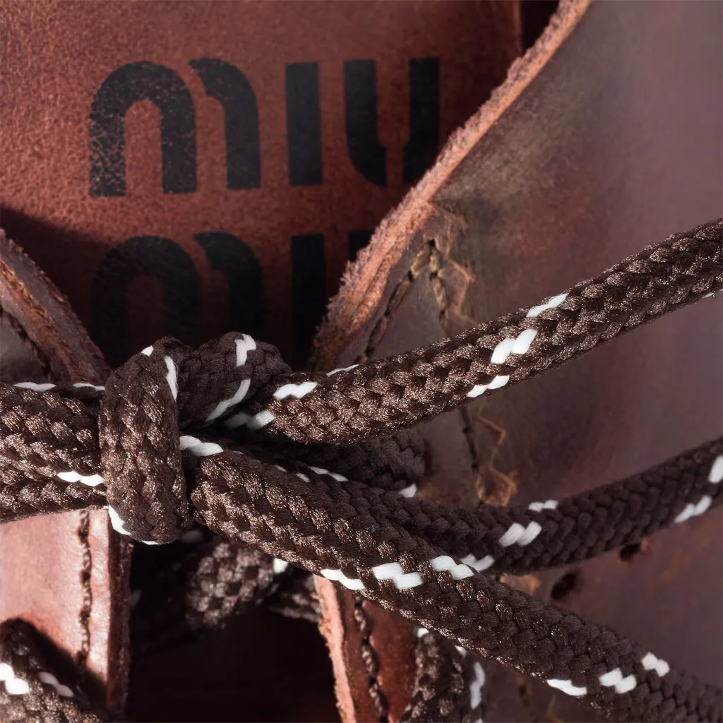 Plume Leather Sneakers