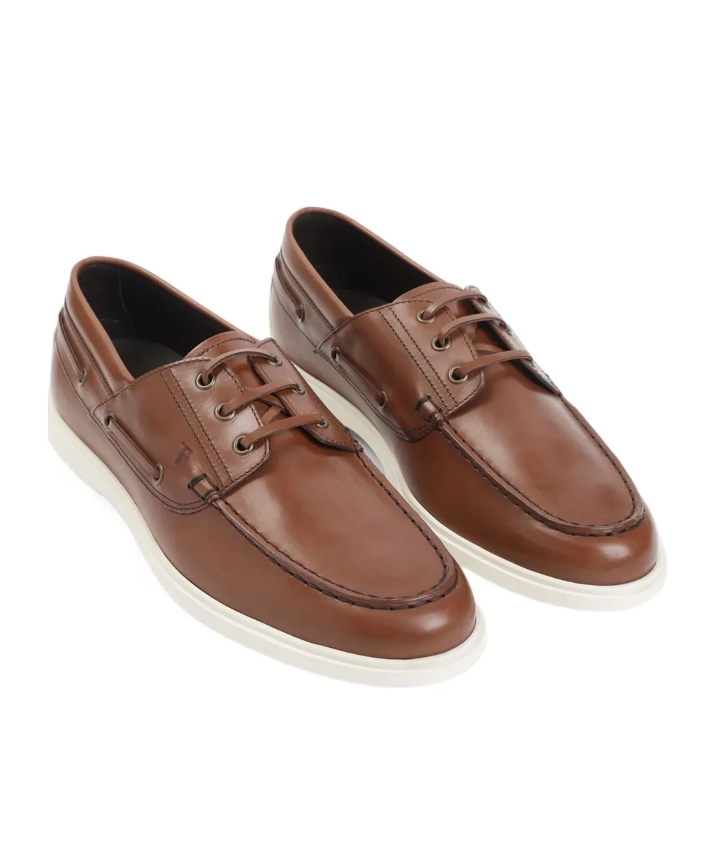 Tod's Logo Embossed Laced Boat Shoes