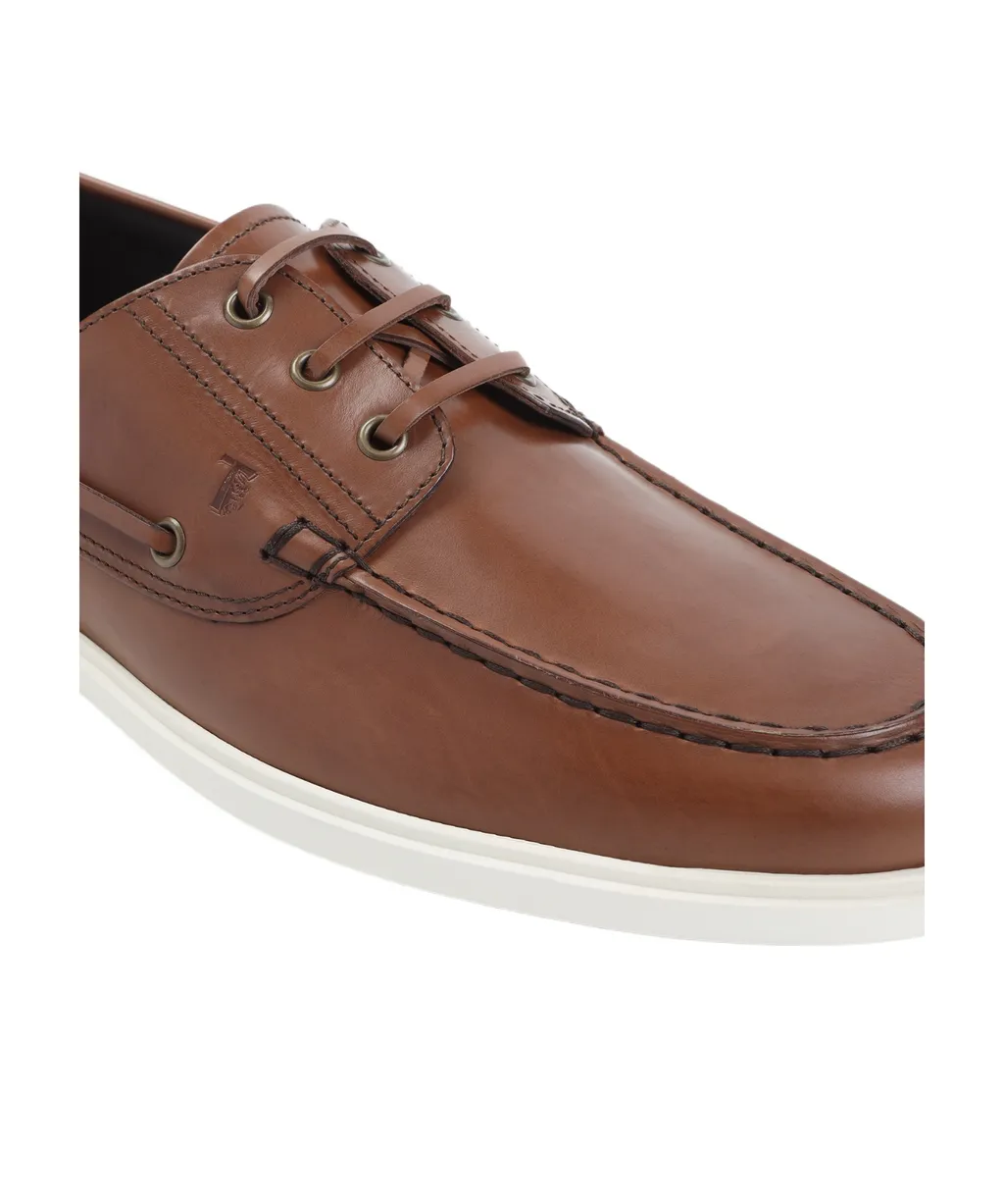 Tod's Logo Embossed Laced Boat Shoes