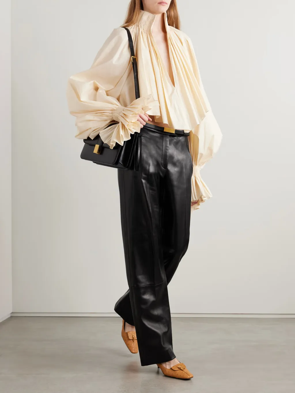 Khaite Durer Smocked Puff-Sleeve Crop Top