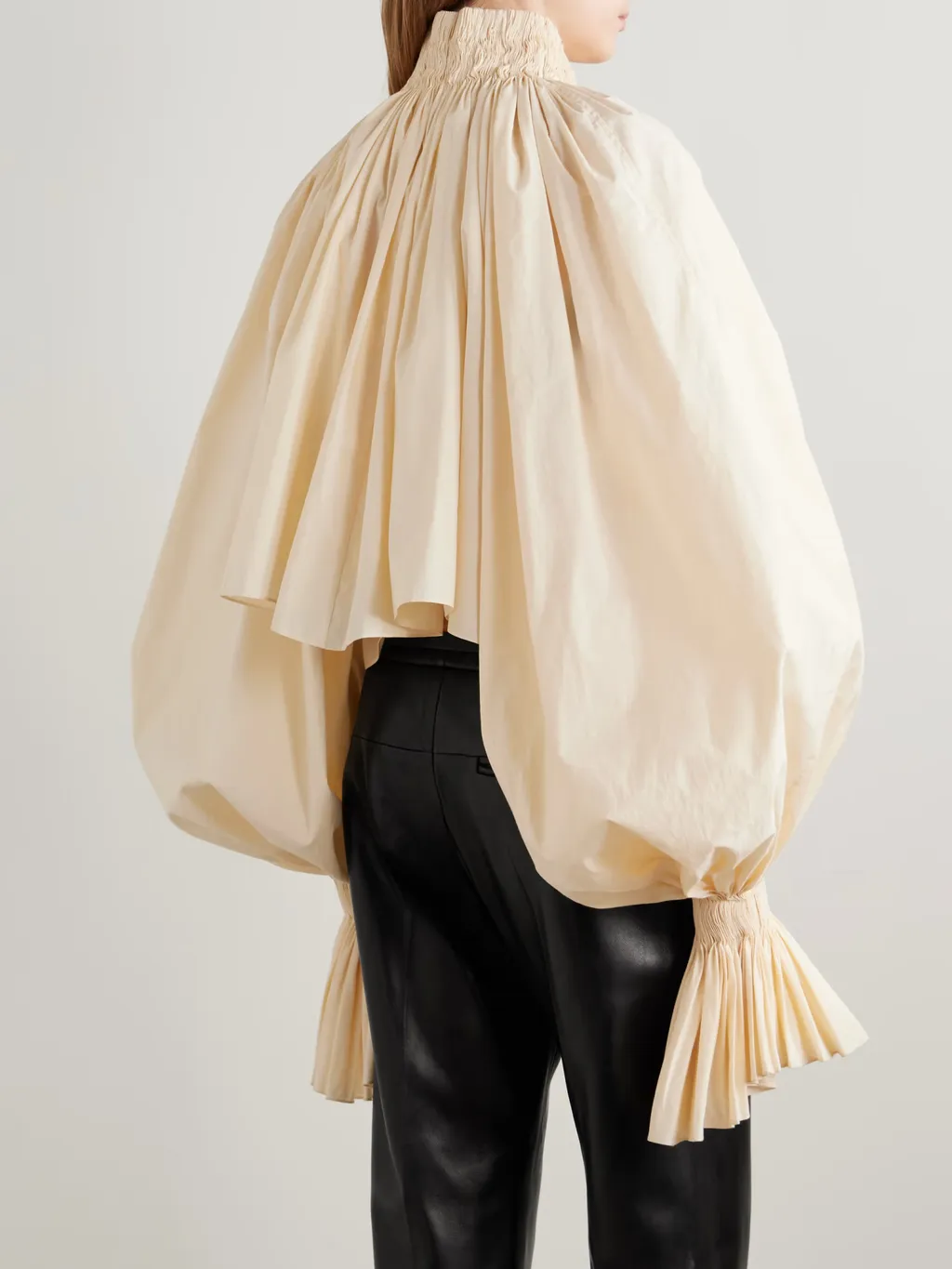 Khaite Durer Smocked Puff-Sleeve Crop Top