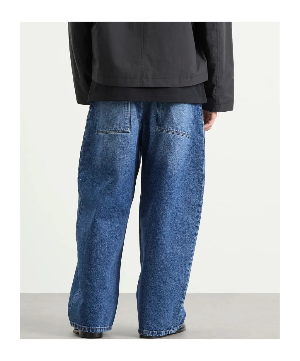 Studio Nicholson Logo Patch Cropped Wide-Leg Jeans