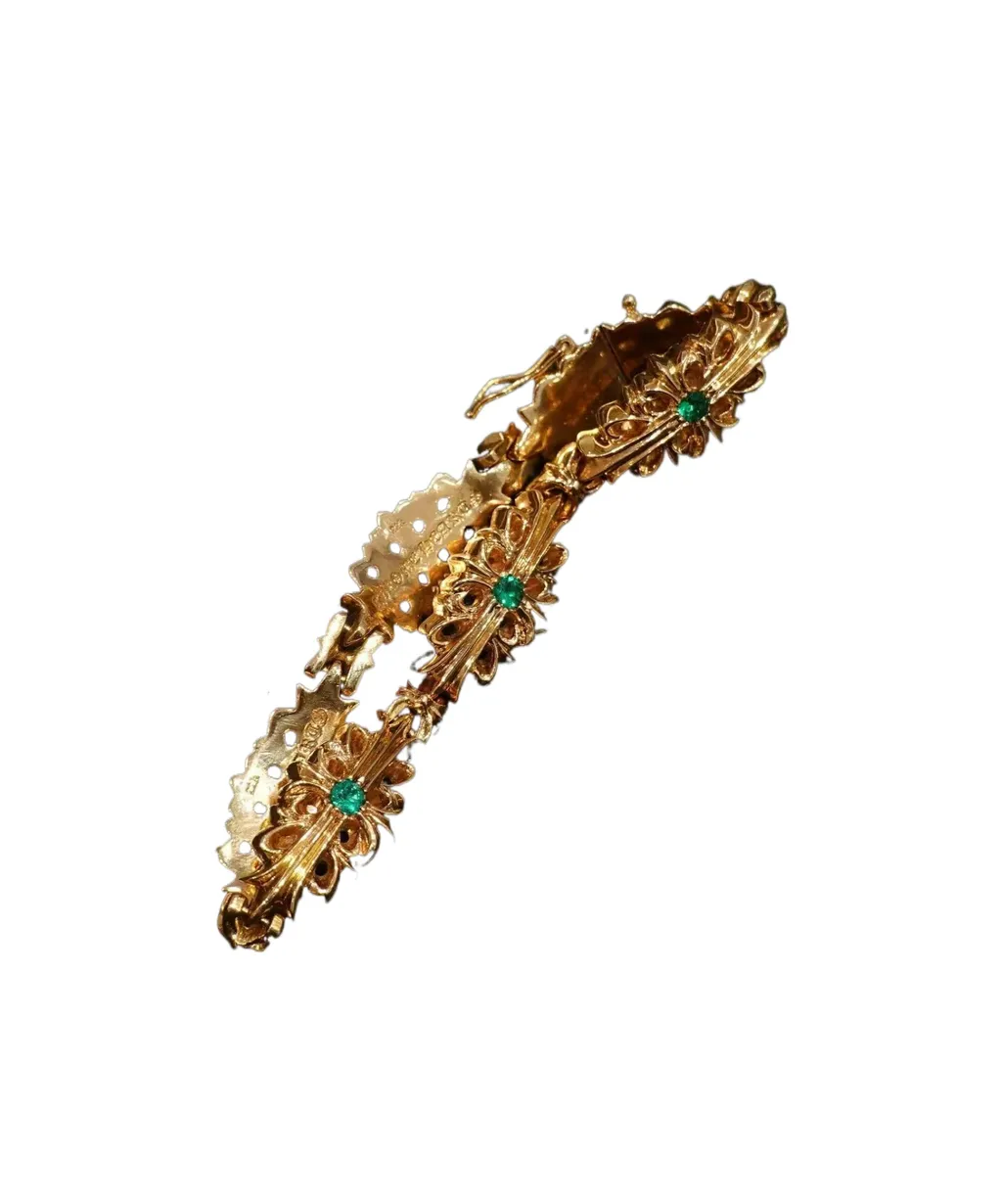 22K Gold Bracelet With Green Diamonds And Cross-Shaped Carvings.