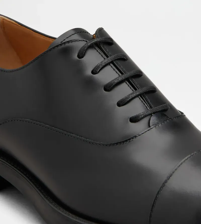 Tod's Almond Toe Lace-Up Shoes