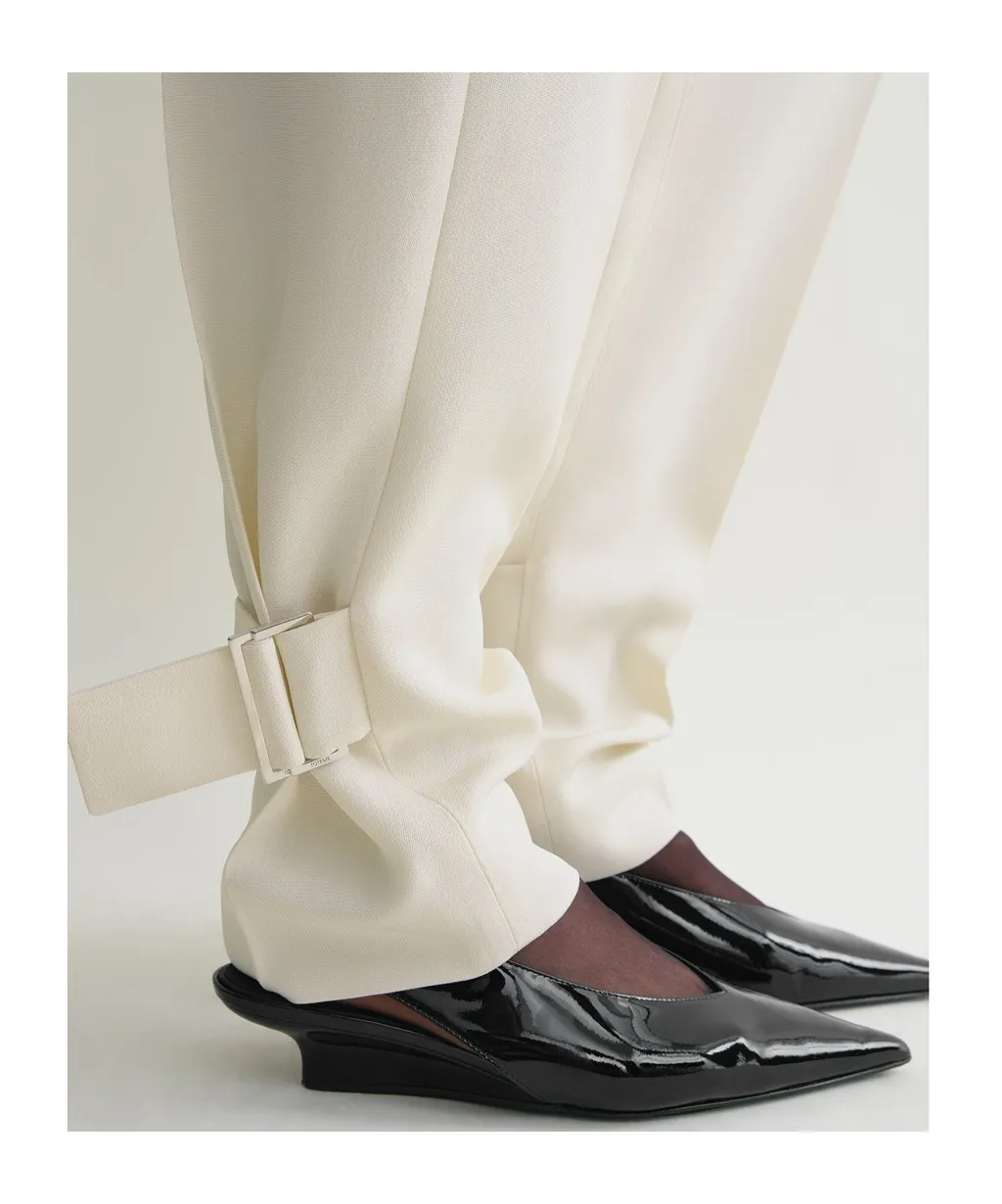 TotÊMe Presse Creased Buckled Slouch Trousers