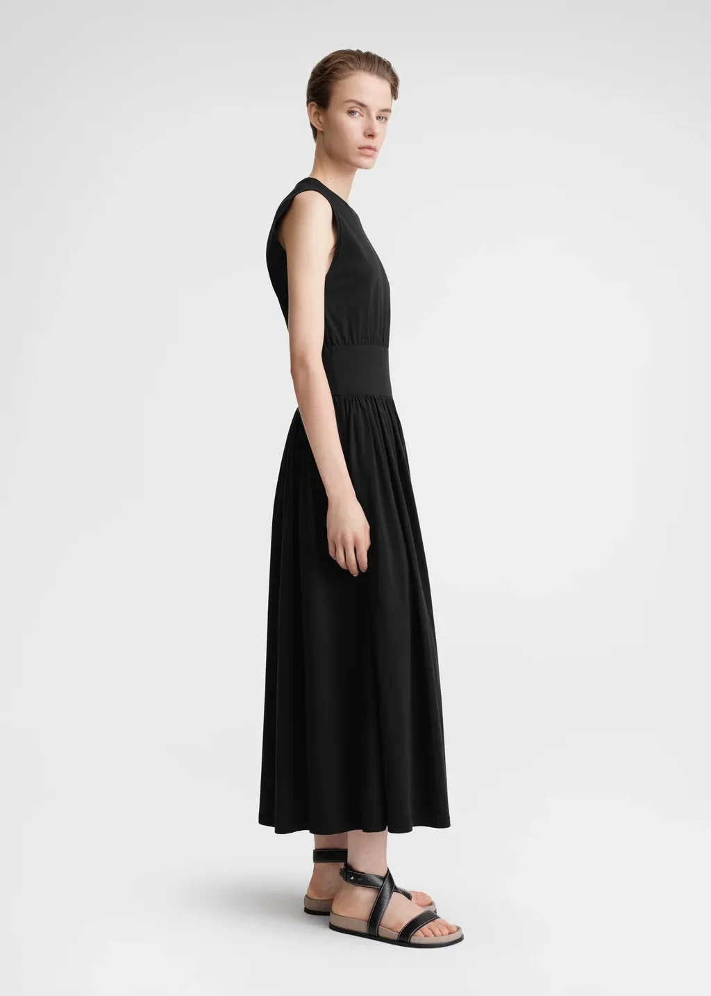 A Sleeveless Pleated Dress
