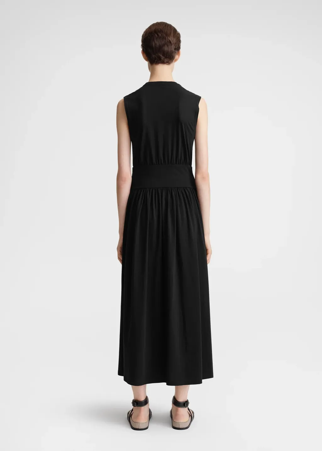 A Sleeveless Pleated Dress