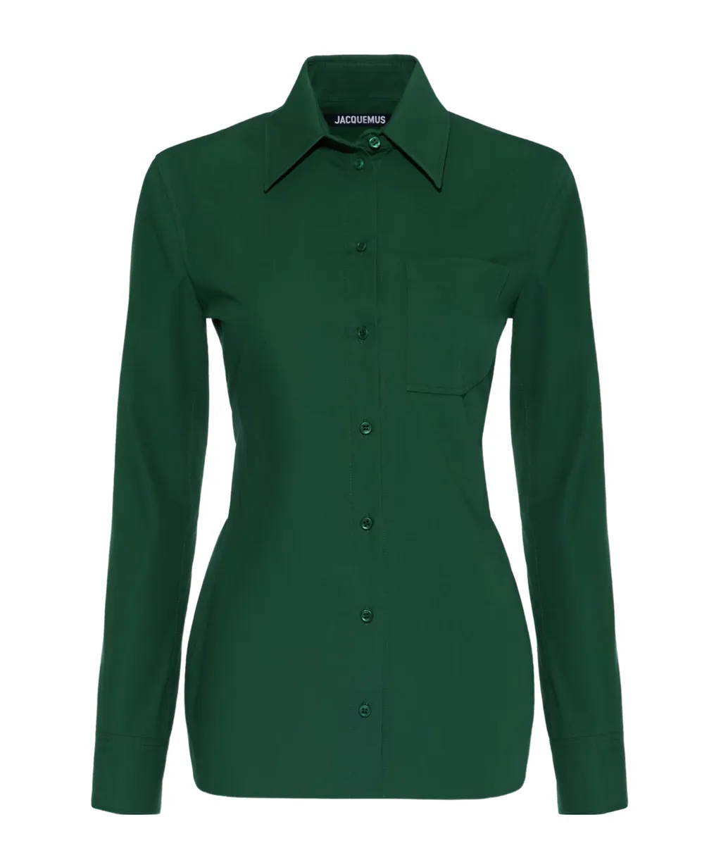 A Shirt With A Pointed Collar And A Bare Back
