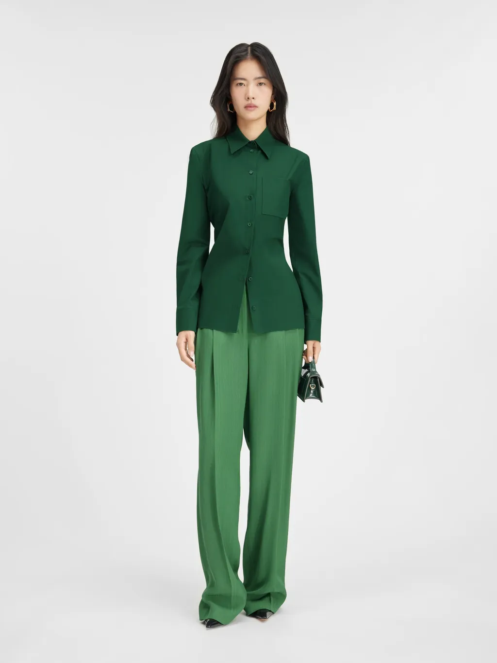 A Shirt With A Pointed Collar And A Bare Back