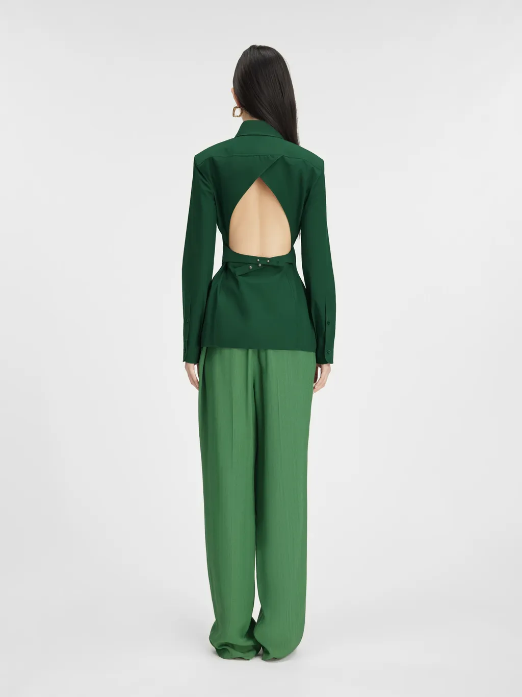 A Shirt With A Pointed Collar And A Bare Back