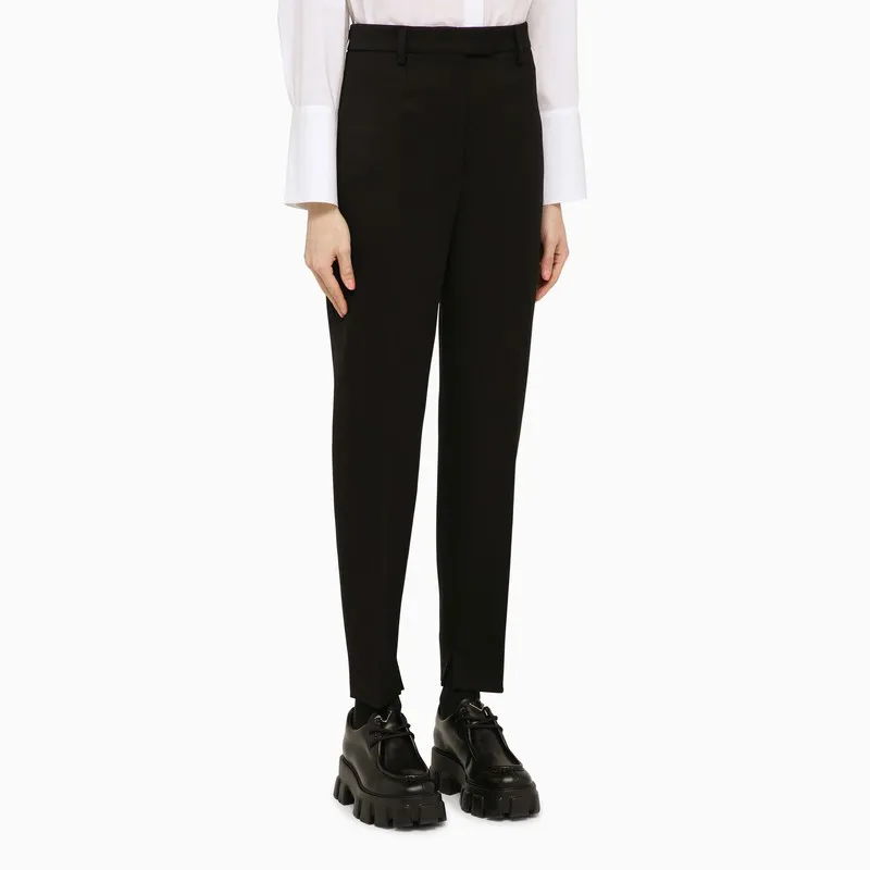 Prada Pleated Tapered-Leg Trousers