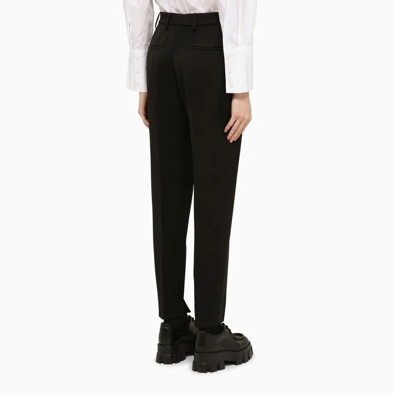 Prada Pleated Tapered-Leg Trousers