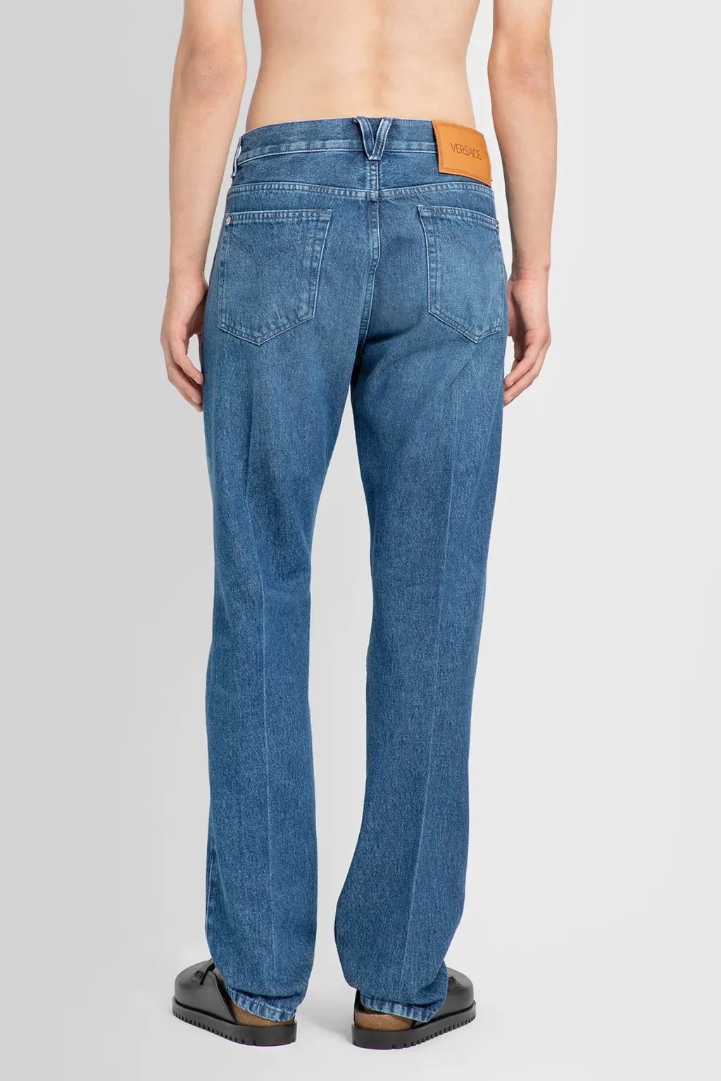Versace Logo-Patch Stretched Jeans