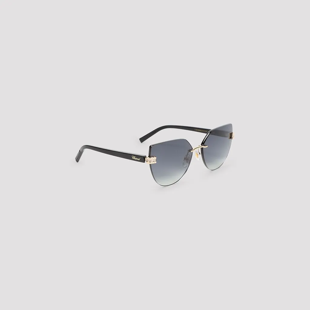 Chopard Eyewear Schm 49 S Rimless Sunglasses