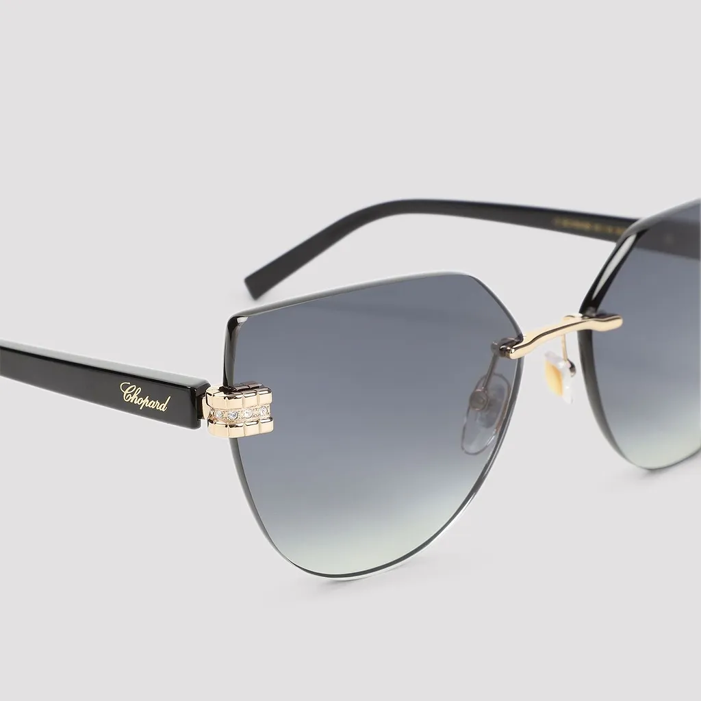 Chopard Eyewear Schm 49 S Rimless Sunglasses