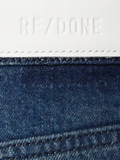 Denim Trousers With Logo Affixed