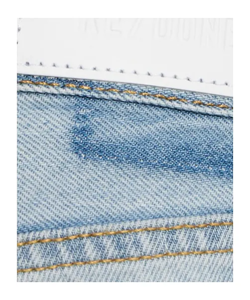Ripped Denim Pants With Decorative Hem