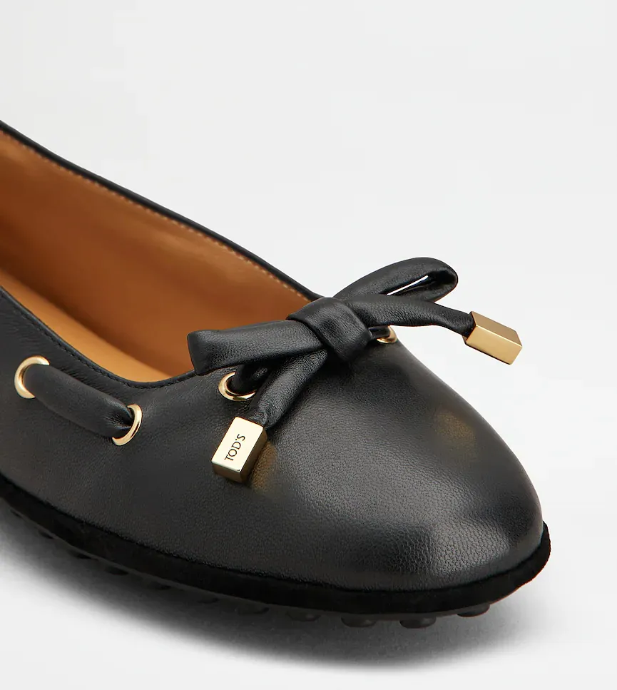 Tod's Bow-Detailred Round-Toe Flat Shoes