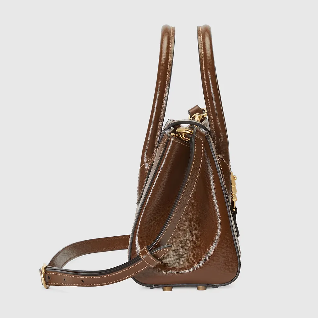 Small Tote With Piston Closure