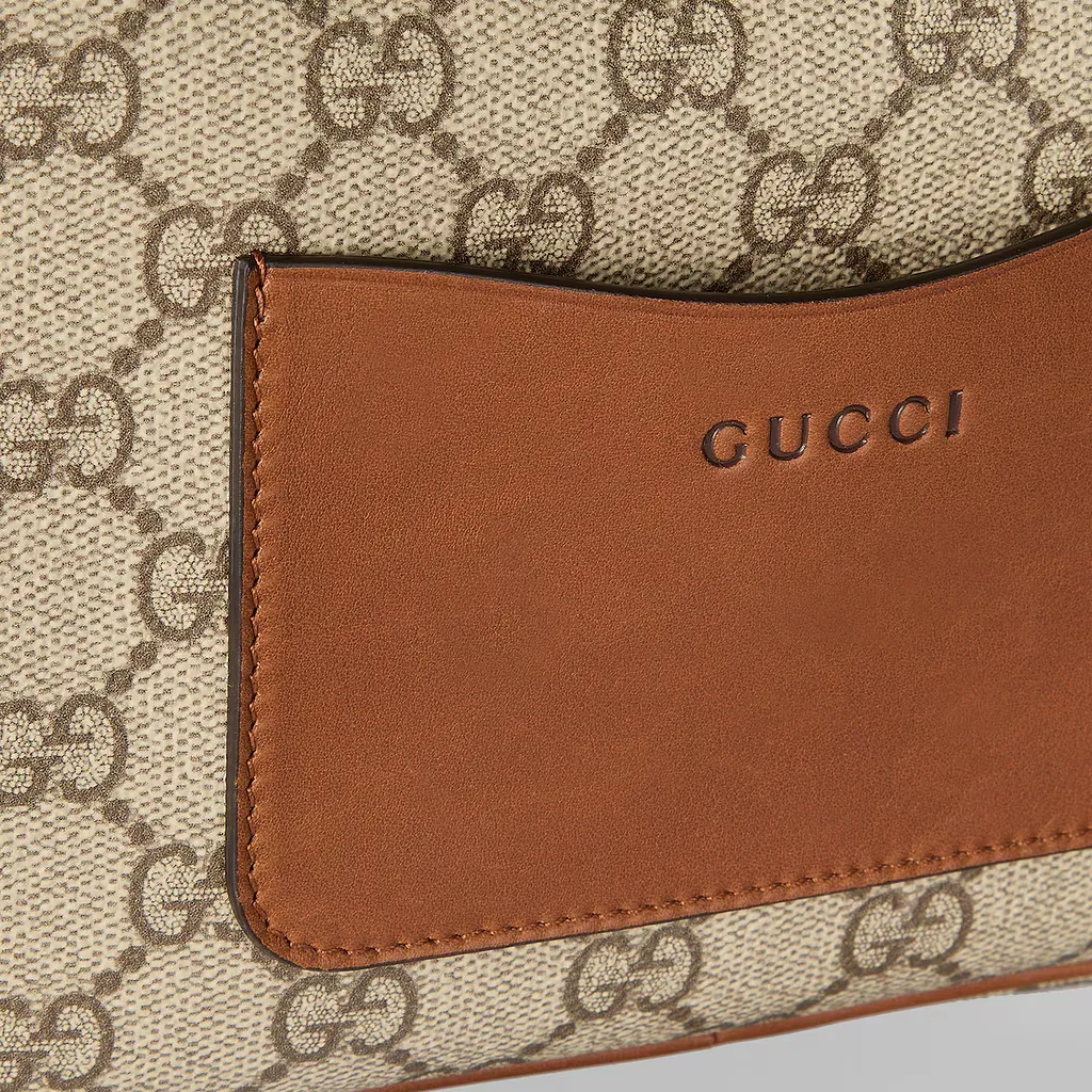 Gg Emblem Embossed Super Mini Bag