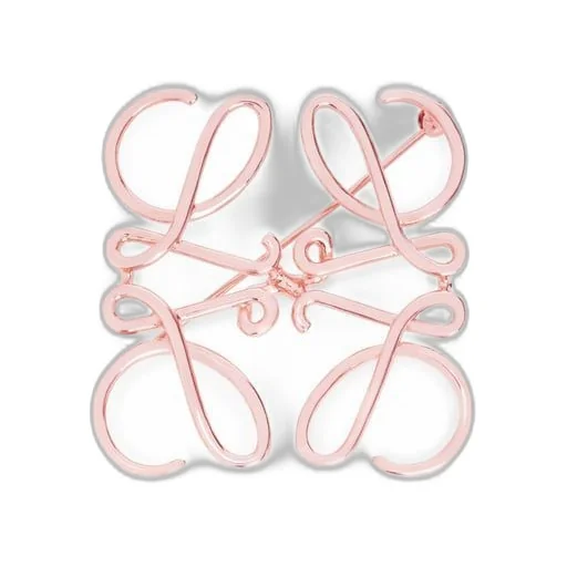 Anagram brooch in metal