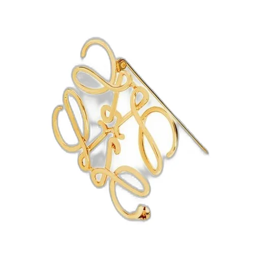 Anagram brooch in metal