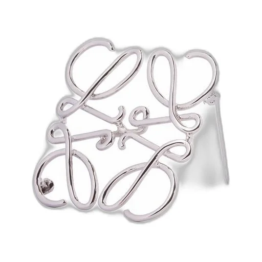 Anagram brooch in metal