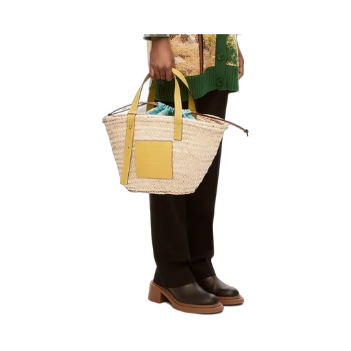 Basket bag in palm leaf and calfskin
