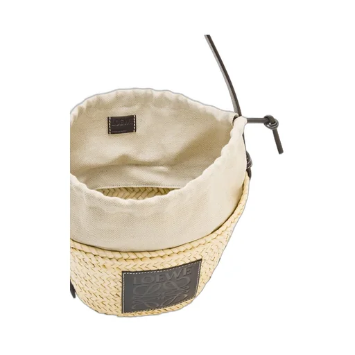 Drawstring bucket bag in palm leaf and calfskin