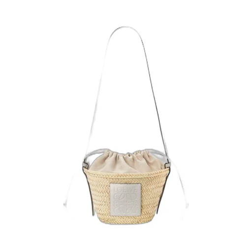 Drawstring bucket bag in palm leaf and calfskin