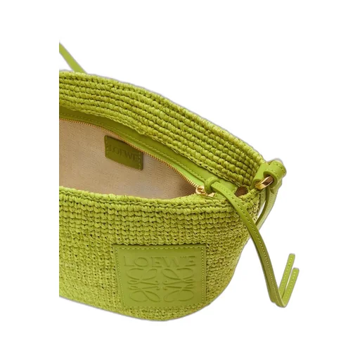 Slit Pochette bag in raffia and calfskin