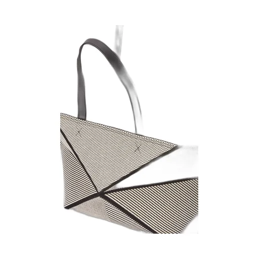 XXL Puzzle Fold tote in canvas jacquard and calfskin